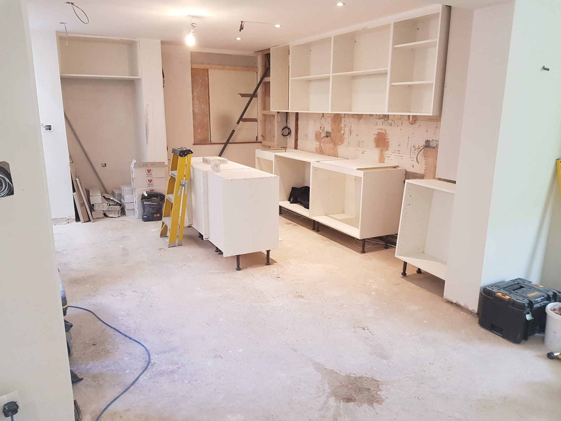 Kitchen cabinetry installation in progress